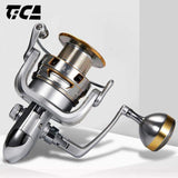 Tica GEAC6000 metal spinning fishing reel with gold accents on white background, ReelsDeal NZ